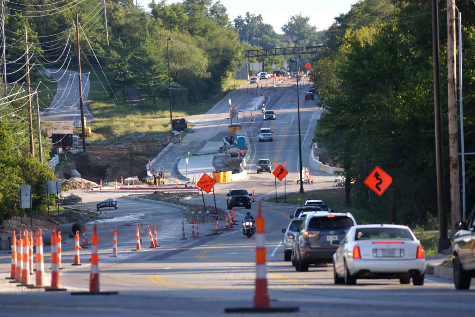 traffic driving through road construction