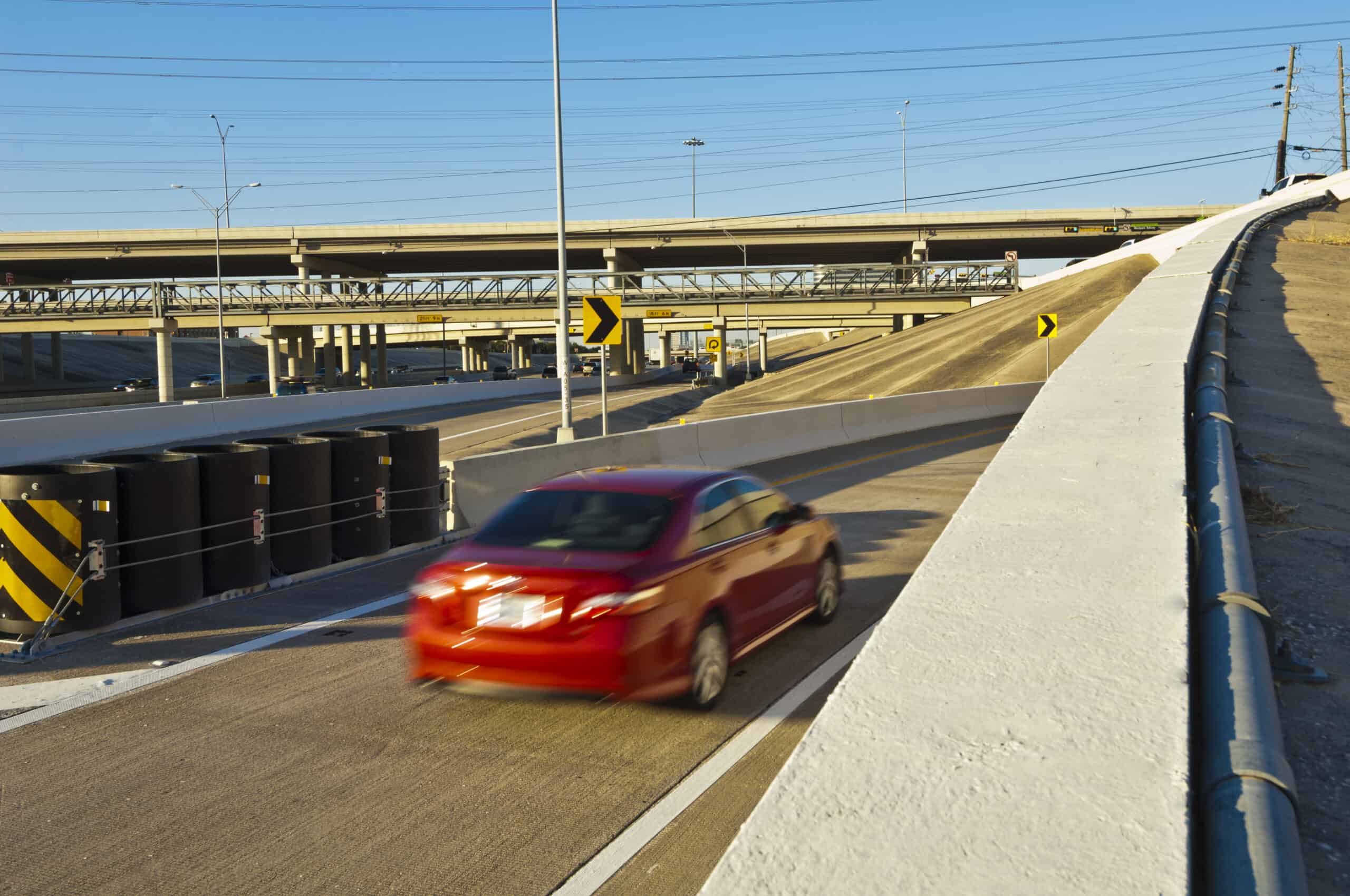 Car exiting a parkway.