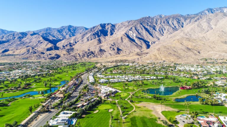 A beautiful aerial of Palm Springs and Palm Desert taking during a gorgeous blue-sky morning with 25+ miles of visibility.