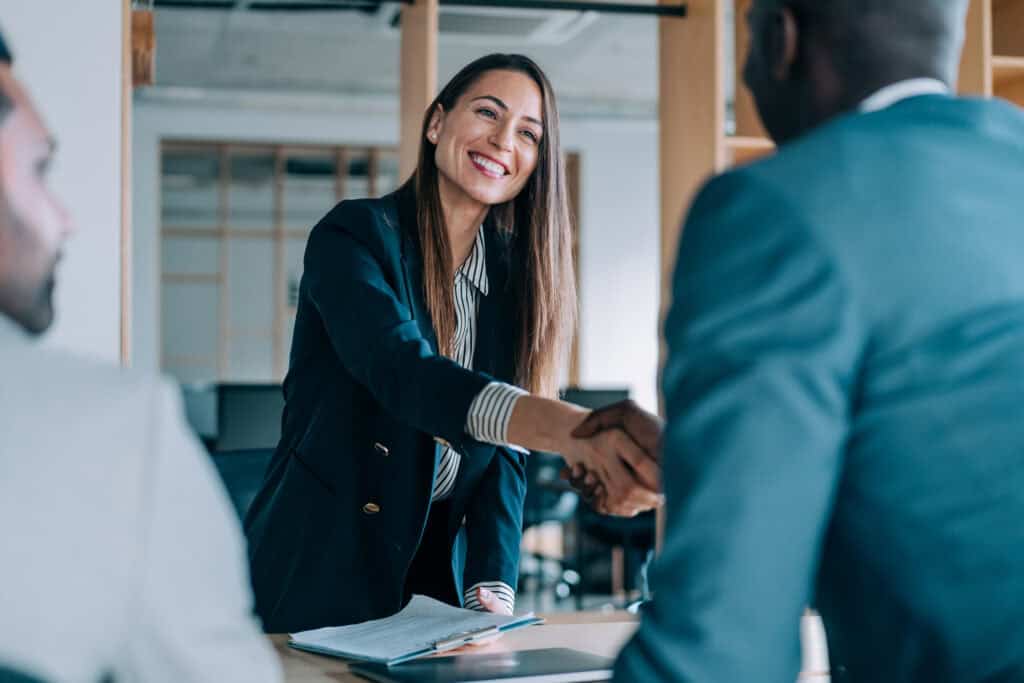 Engineer and municipal leader shaking hands